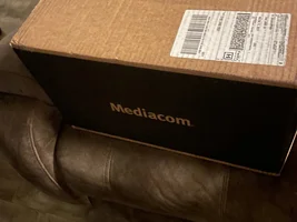 Hello, could you tell me where the port for connecting the MF800 to the laptop is located?