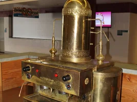 New to business and need help on make/model of this antique machine