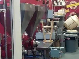 Wire brushes in cooling bins
