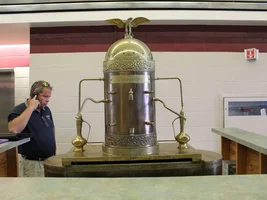 New to business and need help on make/model of this antique machine